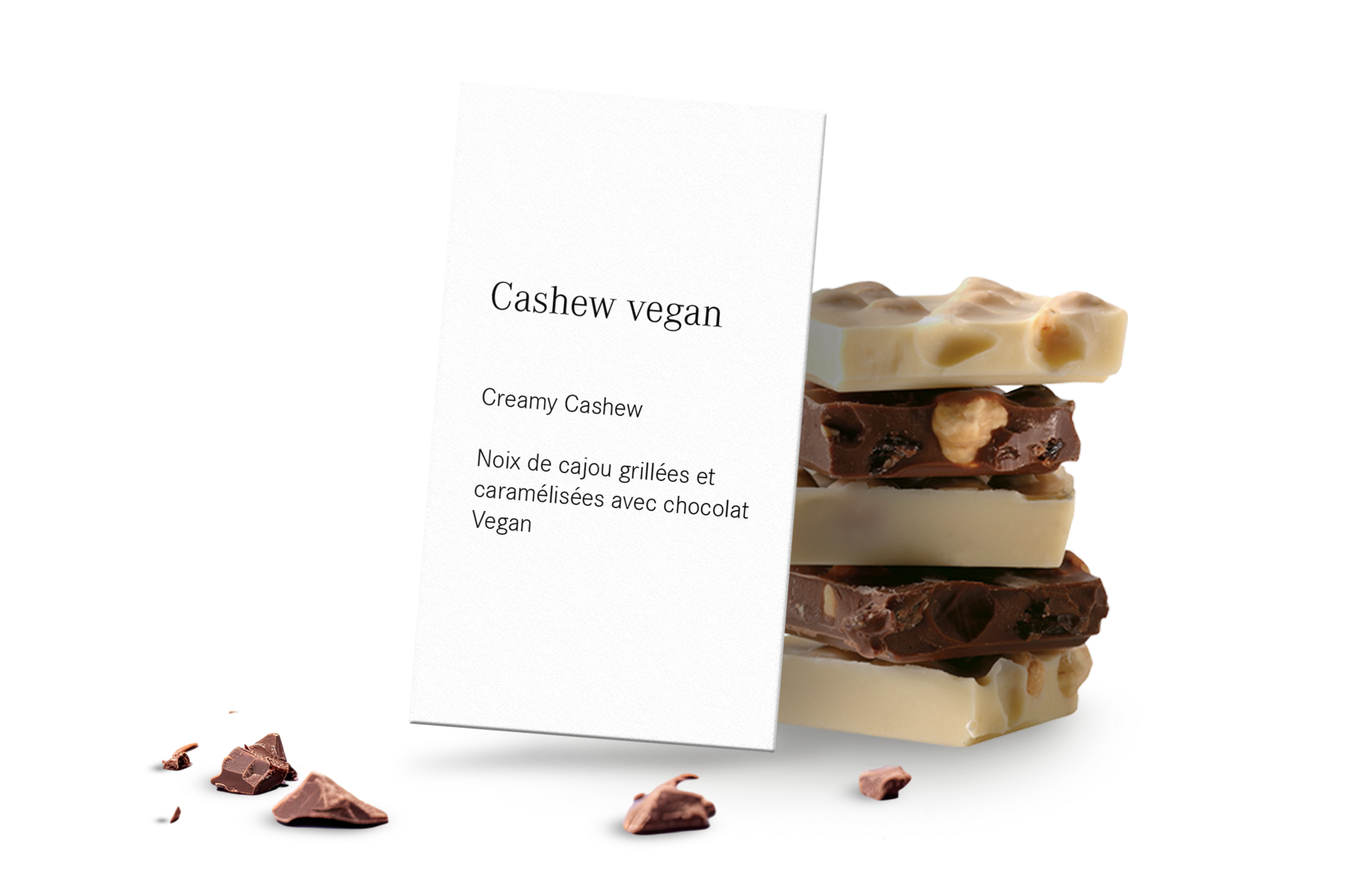Panneau avec l'inscription Cashew vegan et chocolat en arrière-plan